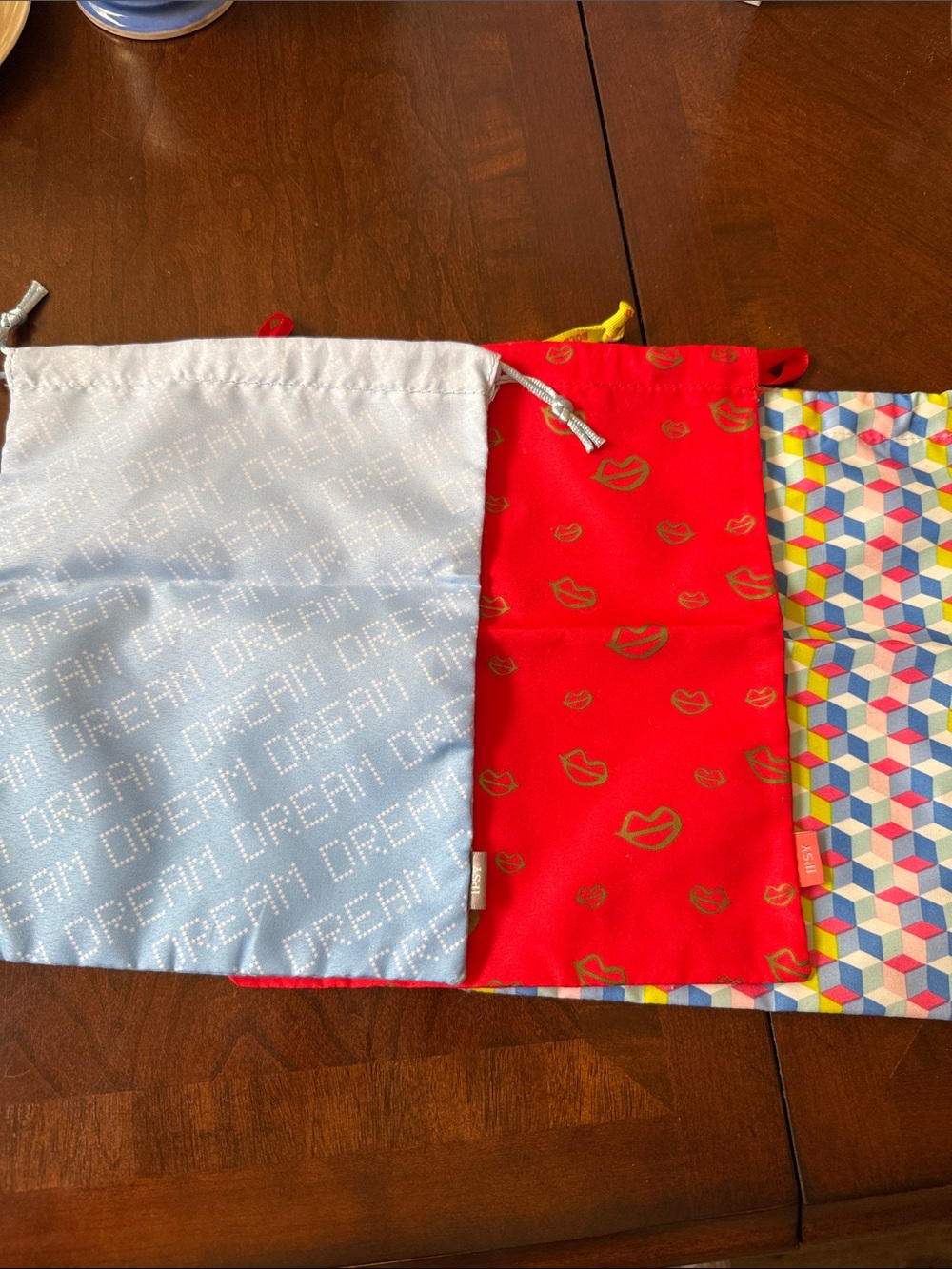 Ipsy set of 3 Drawstring glam Bags blue red and multicolor